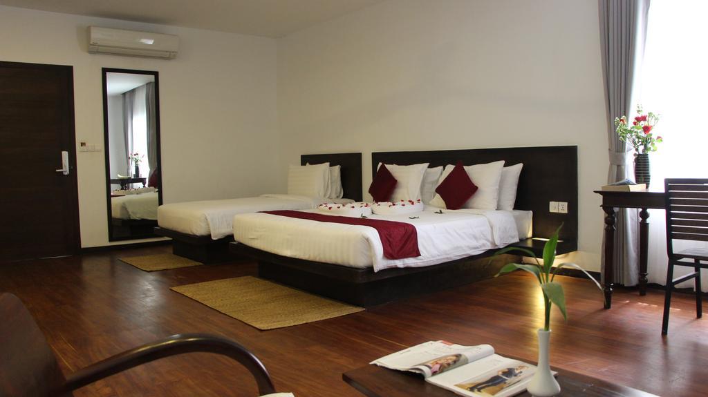 Palm Tree Boutique Hotel Phnom-Penh Buitenkant foto